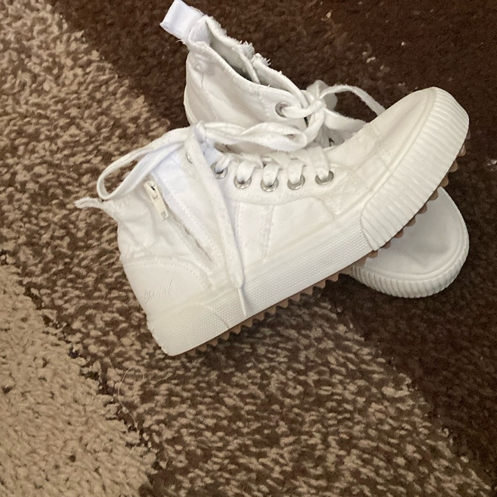 Blowfish white tie up and zip up boots.